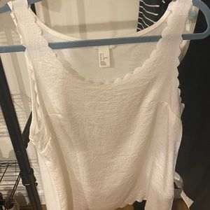 Scalloped white tank